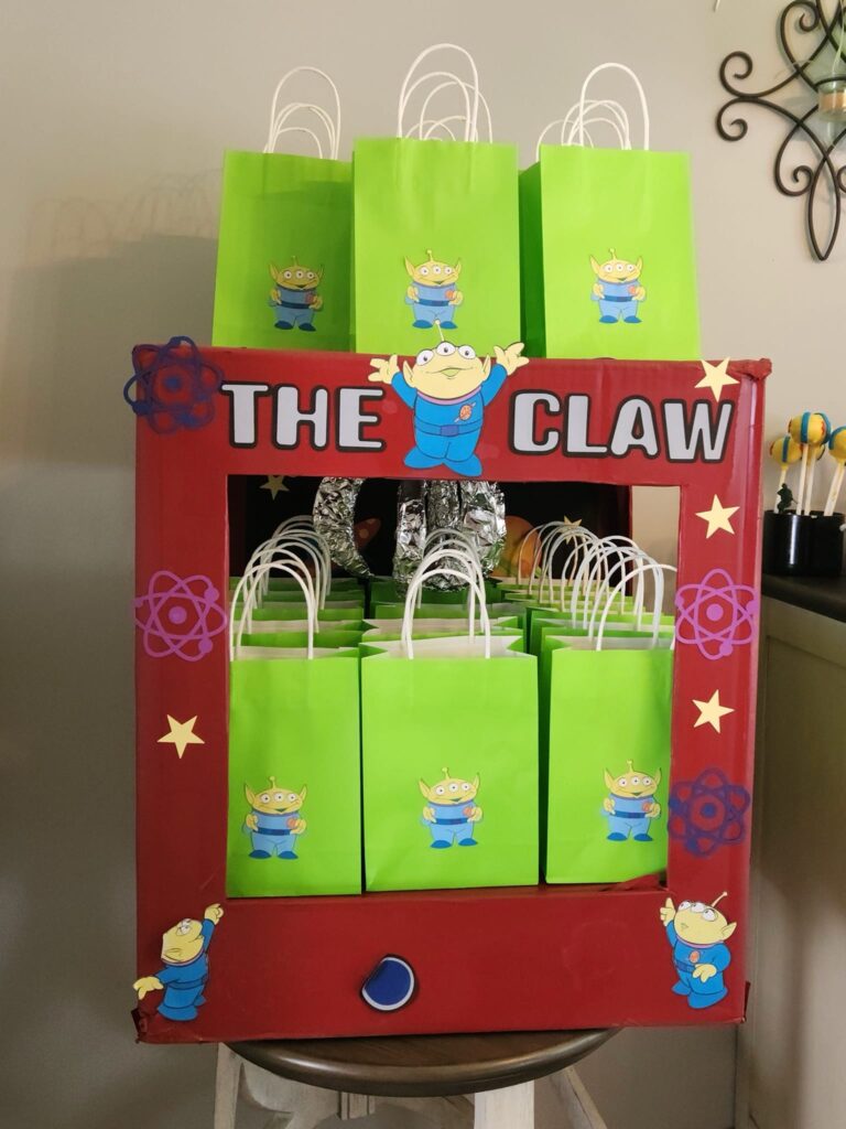 Toy Story themed diy claw machine box with party favor bags