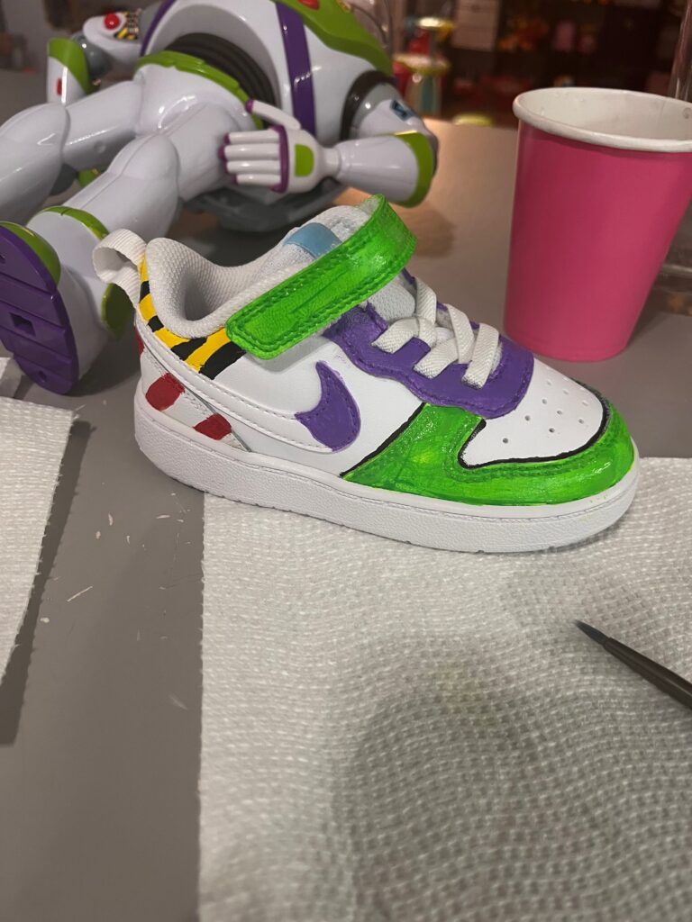 Side of Buzz Lightyear hand painted custom sneaker