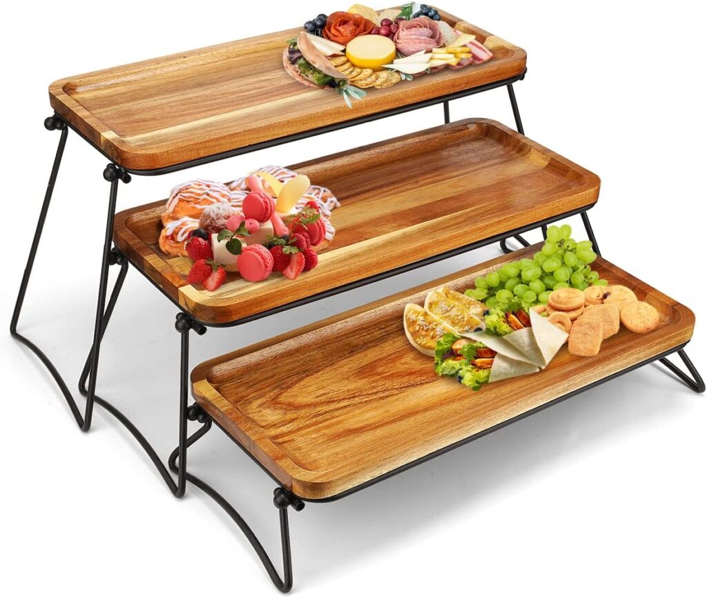 rustic wooden trays with party appetizers on buffet