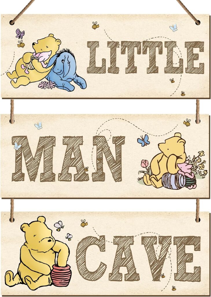 Vintage Winnie the Pooh nursery wall sign featuring “Little Man Cave” storybook decor